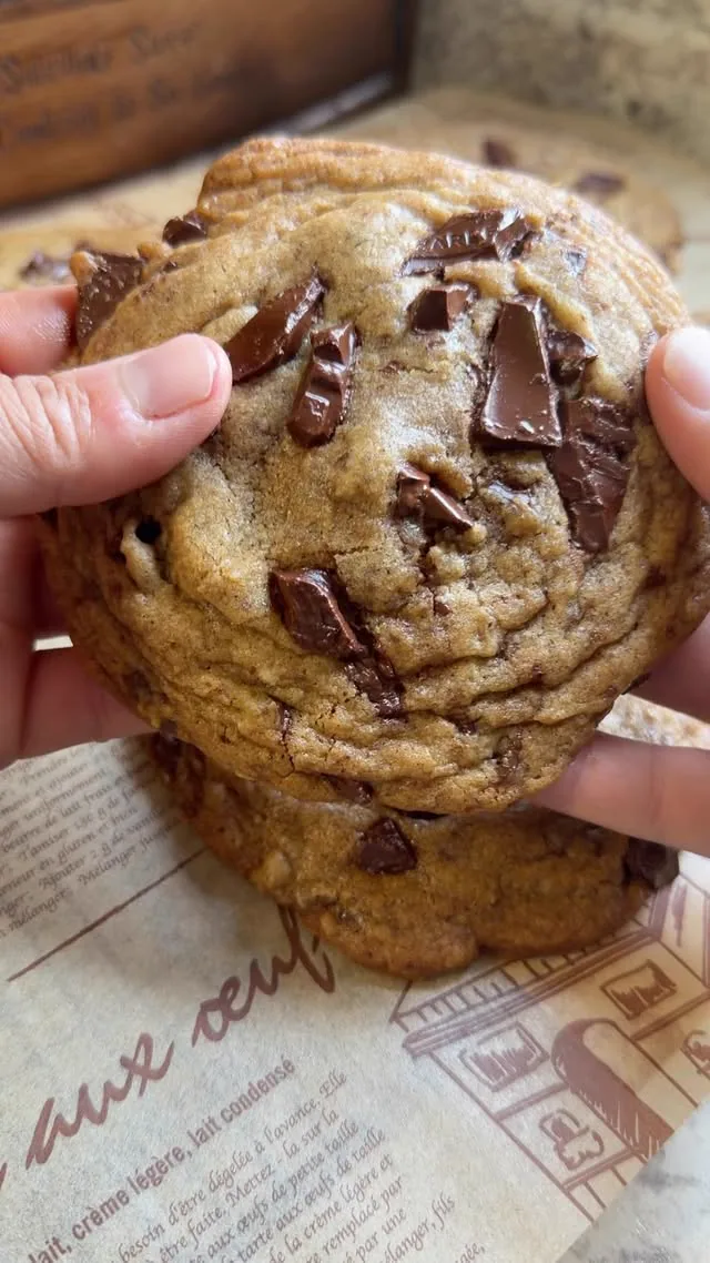 A freshly baked brown butter chocolate chip cookie